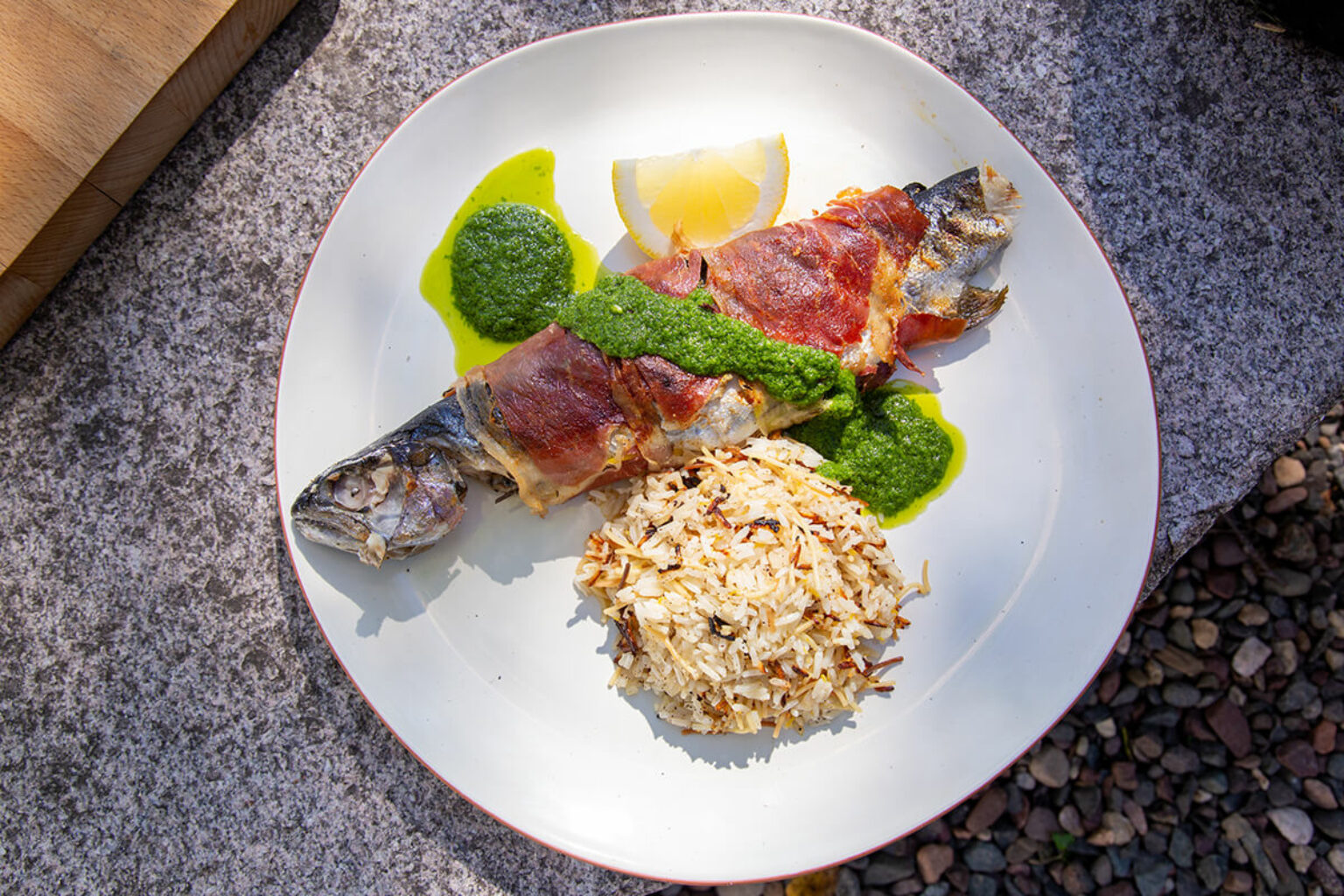 Prosciutto Wrapped Grilled Trout With Herb Sauce And Lemon Rice Pilaf