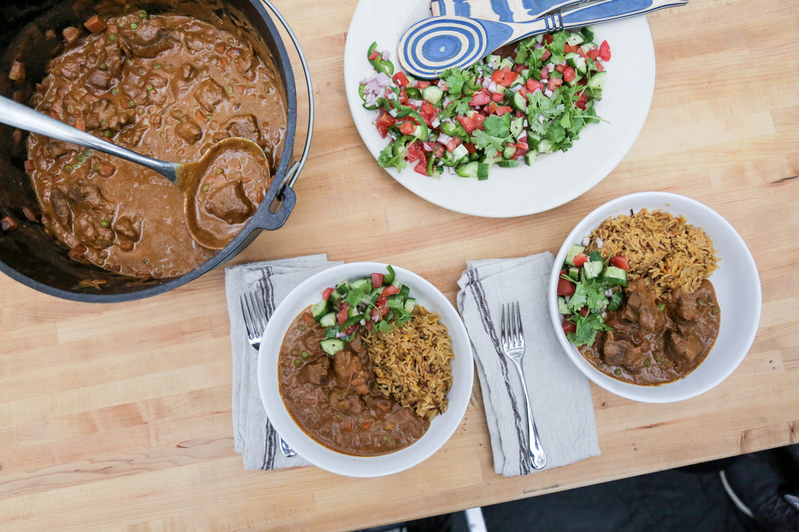 Goat Curry with Tomato-Cucumber Salad & Rice Pilaf - Andrew Zimmern