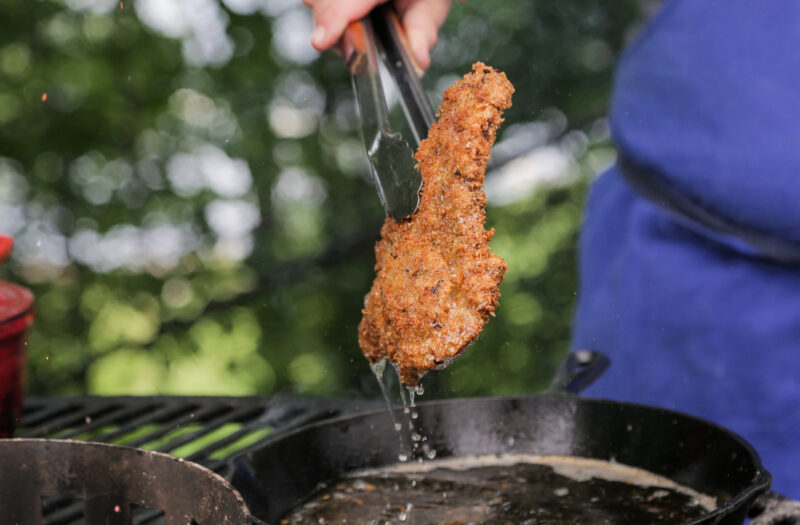 Andrew Zimmern fries beef