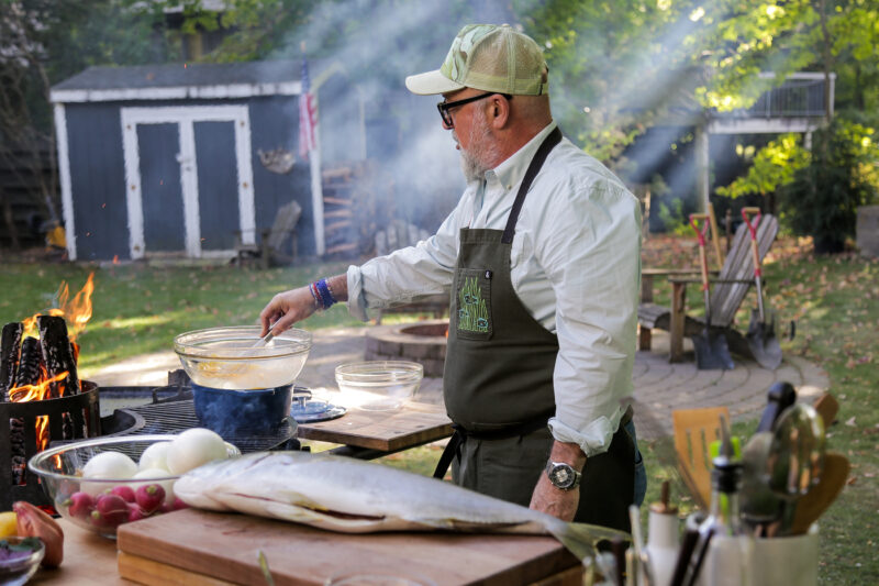 Andrew Zimmern grills yellowtail with miso sauce on wild game kitchen.