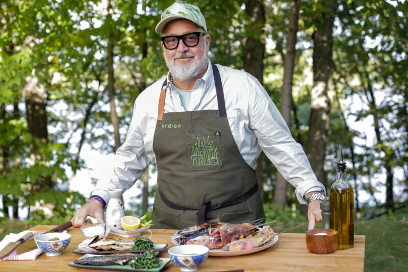 Andrew Zimmern with salt grilled fish