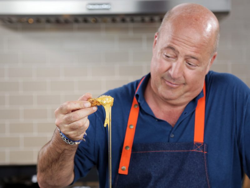 Andrew Zimmern's Corn Pones with Cheese Sauce