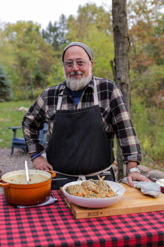 Andrew Zimmern cooks pheasant with wild rice on Field to Fire.