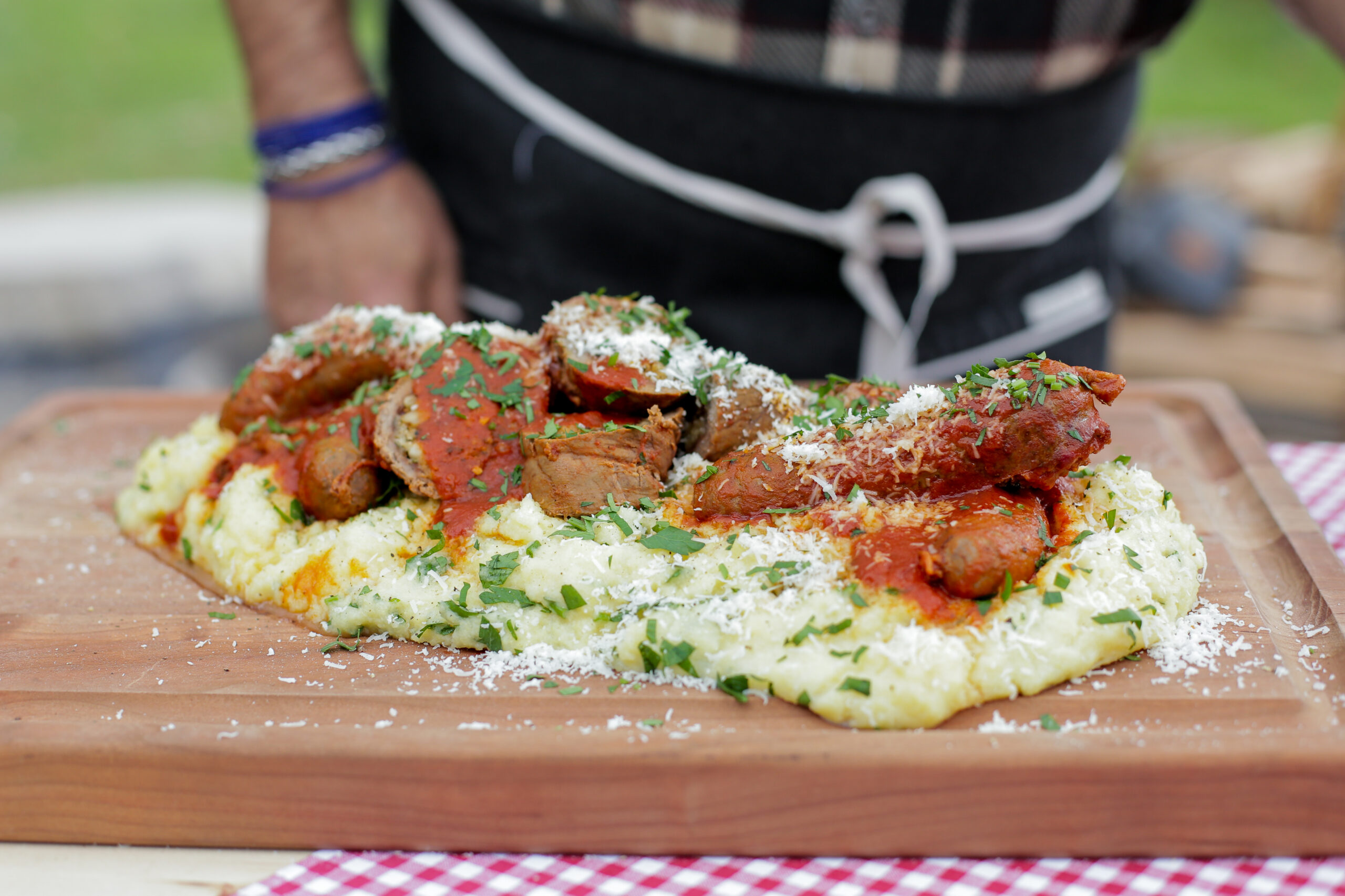 Andrew Zimmern Recipe Nilgai Sunday Sauce with braciole, sausage and polenta.