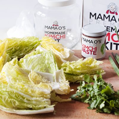 Mama O's Kimchi|Napa cabbage cut into quarters|Sea salt and water brine.|Cabbage in salt and water brine.|Making kimchi|Kimchi|Kimchi|