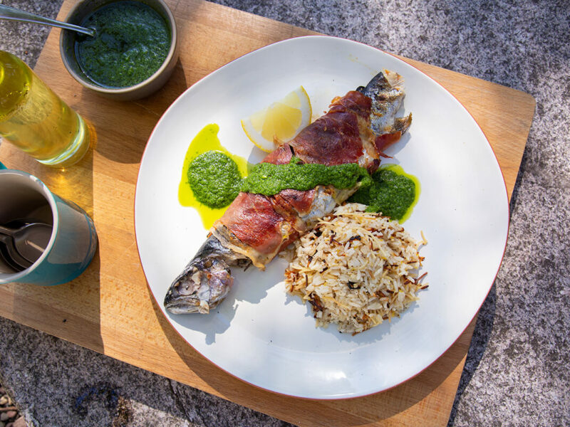 Prosciutto-Wrapped Grilled Trout with Herb Sauce and Lemon Rice Pilaf