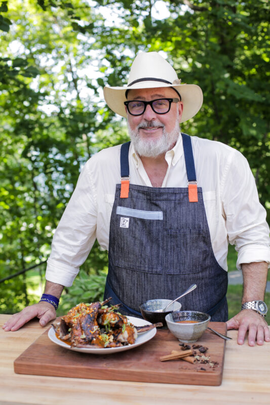 Andrew Zimmern cooks Grilled Rabbit with Sesame Chile Sauce on Wild Game Kitchen. 