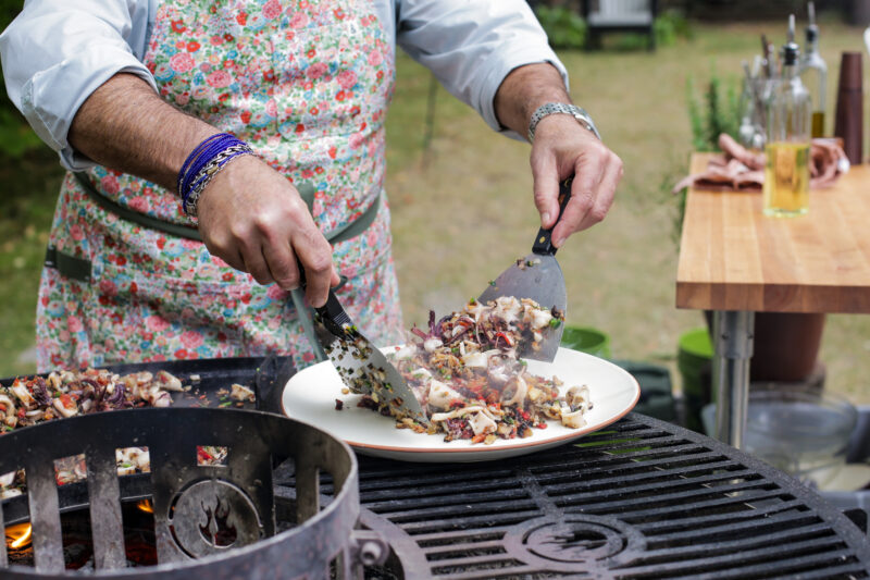 Andrew Zimmern Makes Crispy Squid on the Plancha on Wild Game Kitchen.