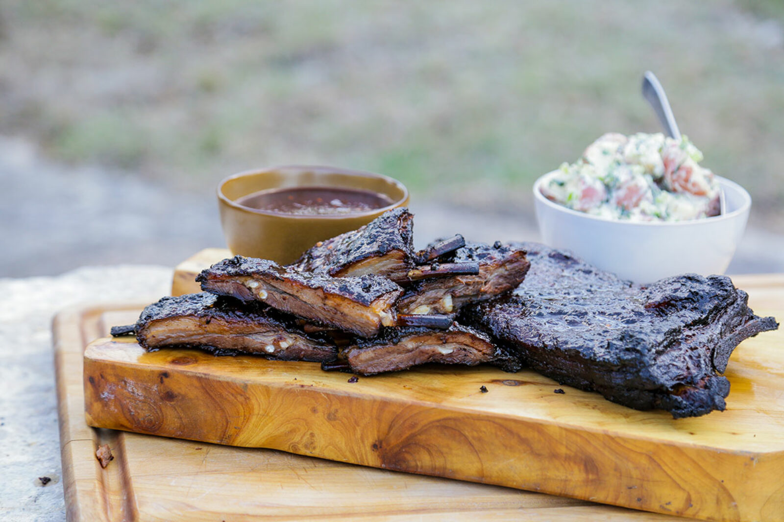 Smoked Wild Boar Ribs with Classic Potato Salad - Andrew Zimmern